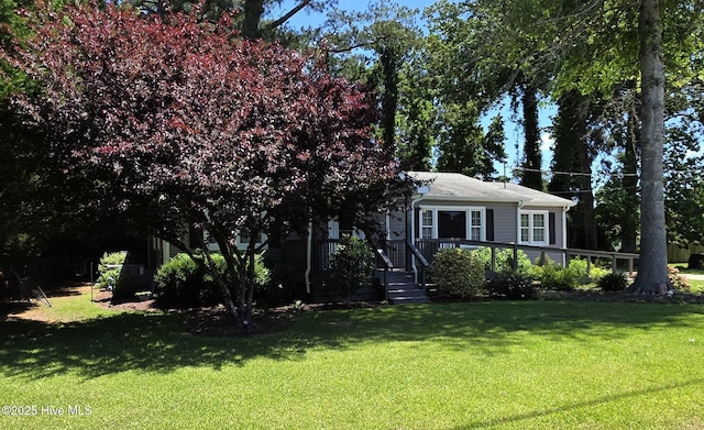 1700 Green Springs Rd, New Bern, NC 28560 - view of front of home with a front lawn and a wooden deck