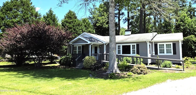 1700 Green Springs Rd, New Bern, NC 28560 - view of front of property with a chimney and a front lawn