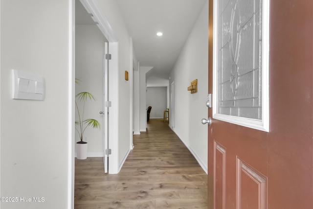 119 Perrytown Loop Rd, New Bern, NC 28562 - corridor with light wood-type flooring, recessed lighting, and baseboards