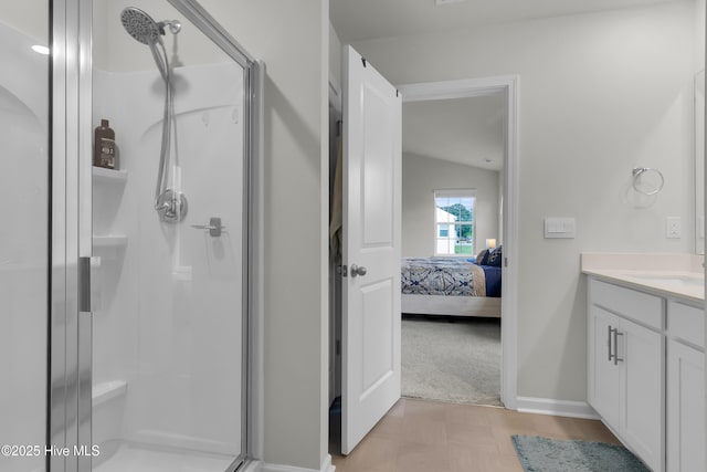 119 Perrytown Loop Rd, New Bern, NC 28562 - ensuite bathroom with vanity, a shower stall, lofted ceiling, and baseboards