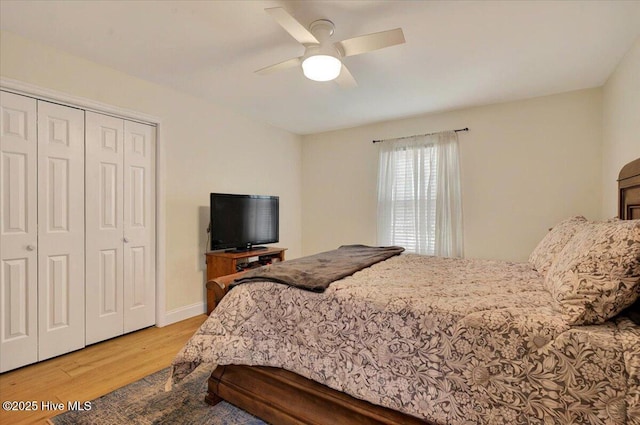 5892 Lycia Ln SW, Ocean Isle Beach, NC 28469 - bedroom featuring wood finished floors, a closet, and a ceiling fan