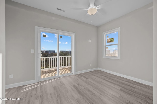 138 Sea Gull Ln, North Topsail Beach, NC 28460 - empty room with wood finished floors, baseboards, and a ceiling fan