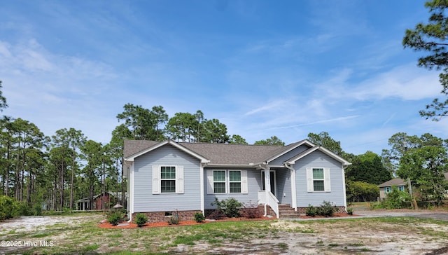 1053 Springdale Rd, Boiling Spring Lakes, NC 28461 - ranch-style home featuring roof with shingles