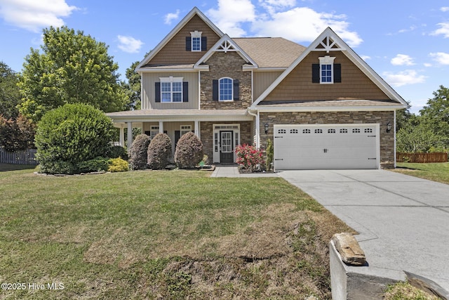 113 Percy Padgett Ct, Holly Ridge, NC 28445 - craftsman-style home featuring stone siding, concrete driveway, a garage, and board and batten siding