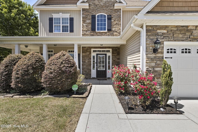 113 Percy Padgett Ct, Holly Ridge, NC 28445 - property entrance featuring stone siding and board and batten siding