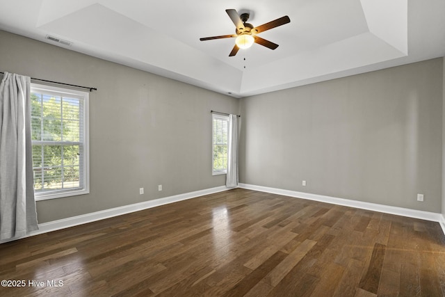 113 Percy Padgett Ct, Holly Ridge, NC 28445 - spare room featuring a ceiling fan, plenty of natural light, and dark wood-style flooring