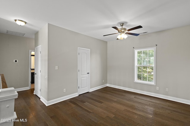 113 Percy Padgett Ct, Holly Ridge, NC 28445 - unfurnished room with dark wood-style floors, a ceiling fan, and baseboards
