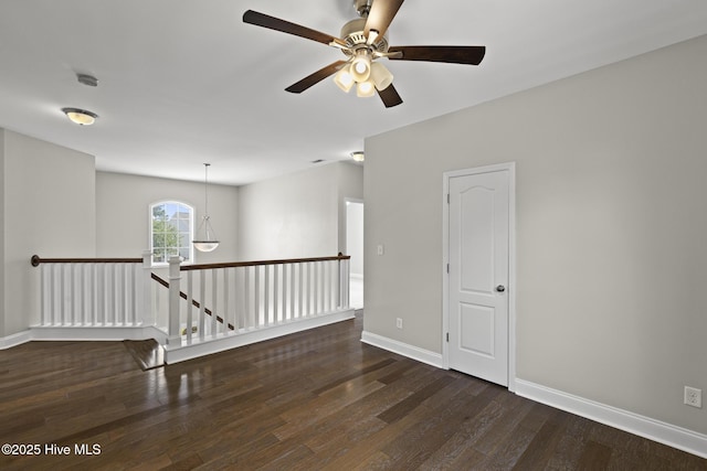 113 Percy Padgett Ct, Holly Ridge, NC 28445 - spare room featuring wood finished floors, a ceiling fan, baseboards, and a smoke detector