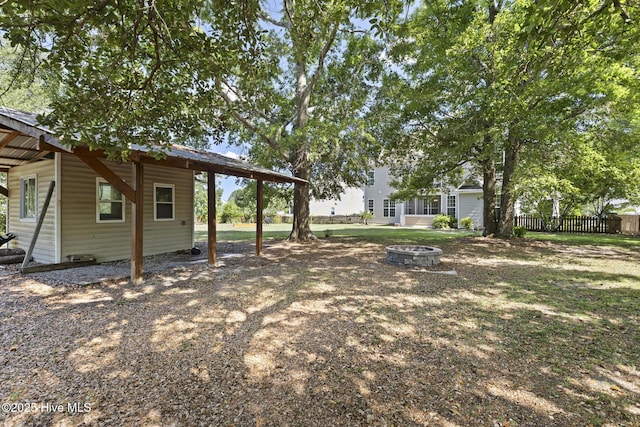 113 Percy Padgett Ct, Holly Ridge, NC 28445 - view of yard featuring an outdoor fire pit