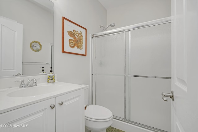 3878 White Blossom Cir, Southport, NC 28461 - bathroom featuring a stall shower, toilet, and vanity