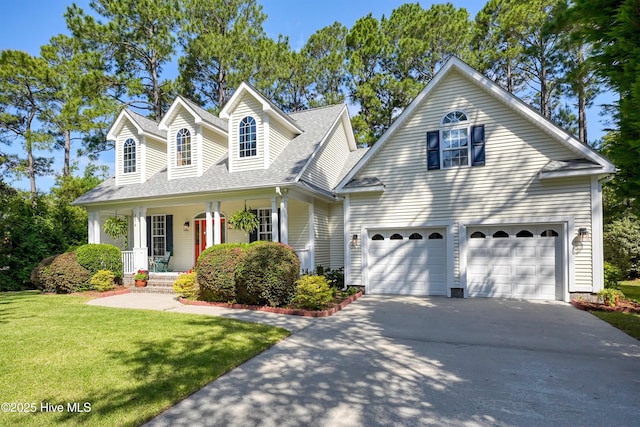 3878 White Blossom Cir, Southport, NC 28461 - cape cod home with driveway, a porch, a front lawn, an attached garage, and roof with shingles