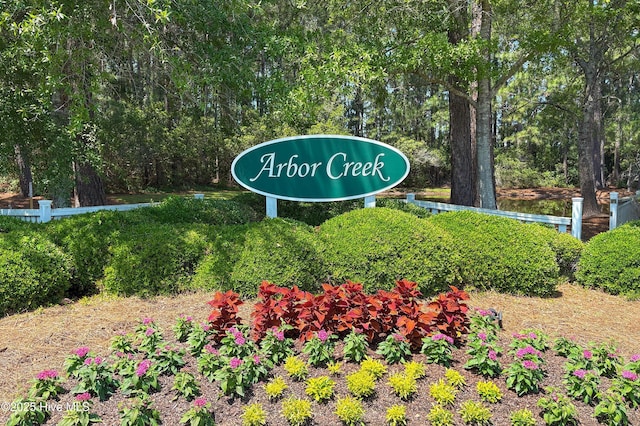 3878 White Blossom Cir, Southport, NC 28461 - community / neighborhood sign featuring a water view
