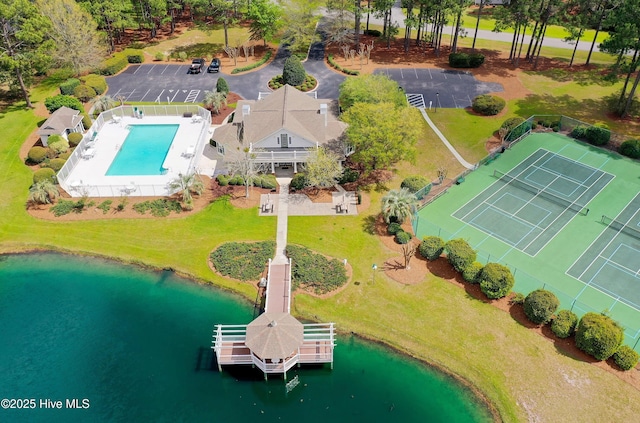 3878 White Blossom Cir, Southport, NC 28461 - aerial view of a pool area and a nearby body of water