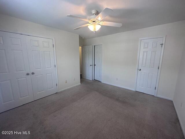 104 Lincoln Place Cir, Leland, NC 28451 - unfurnished bedroom featuring carpet, baseboards, and a ceiling fan