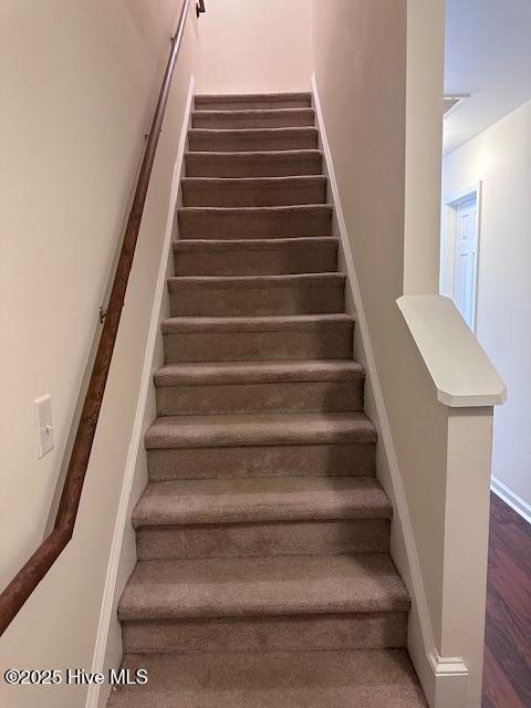 104 Lincoln Place Cir, Leland, NC 28451 - staircase featuring wood finished floors