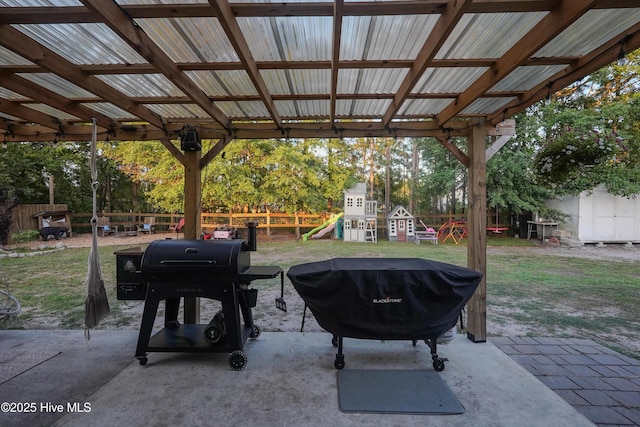 215 Chestwood Dr, Hubert, NC 28539 - view of patio with a playground, a fire pit, and grilling area