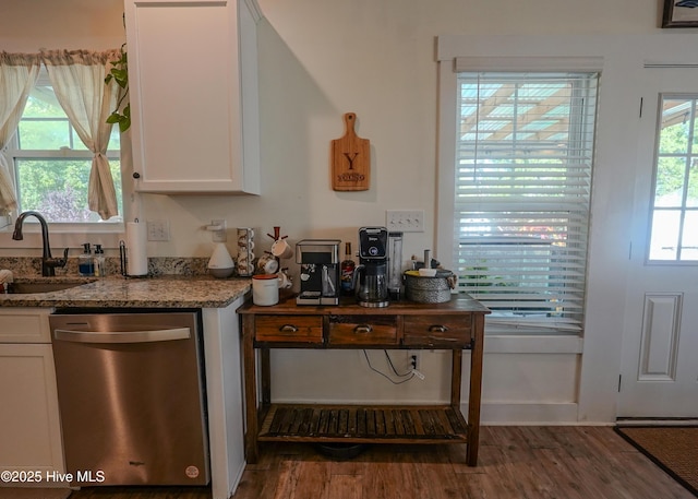 215 Chestwood Dr, Hubert, NC 28539 - kitchen with stainless steel dishwasher, a sink, white cabinetry, and wood finished floors