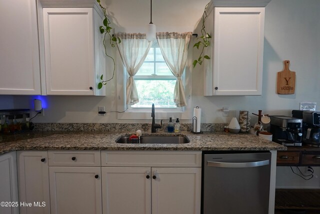 215 Chestwood Dr, Hubert, NC 28539 - kitchen featuring stainless steel dishwasher, white cabinets, a sink, and light stone counters