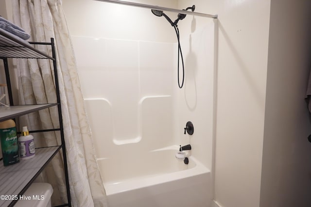 215 Chestwood Dr, Hubert, NC 28539 - full bath featuring shower / bath combo with shower curtain and toilet