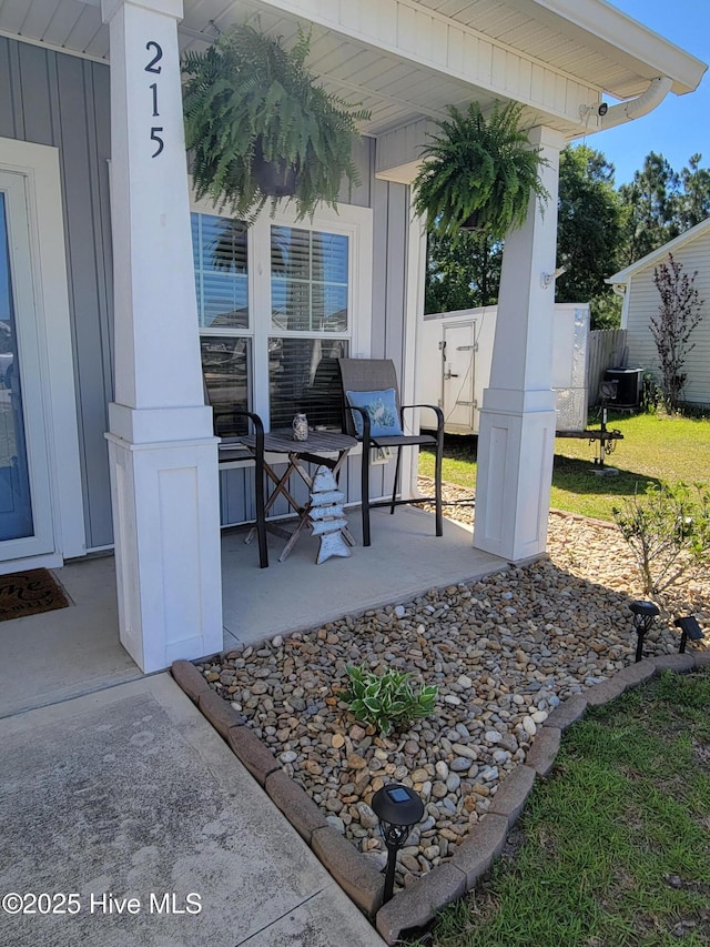 215 Chestwood Dr, Hubert, NC 28539 - view of patio with central AC unit