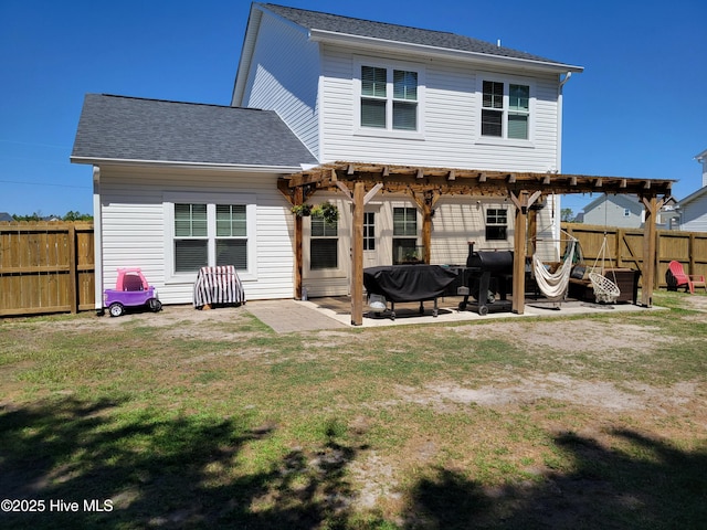 215 Chestwood Dr, Hubert, NC 28539 - back of house with a pergola, a patio, and a shingled roof