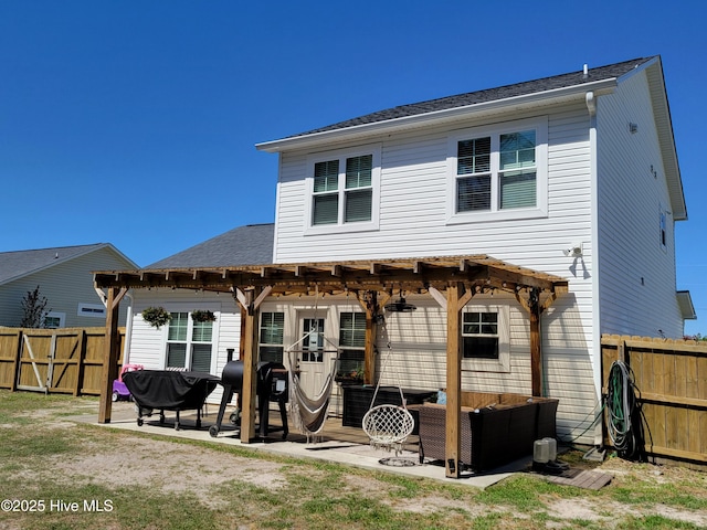 215 Chestwood Dr, Hubert, NC 28539 - back of house with an outdoor living space, a pergola, a fenced backyard, and a patio