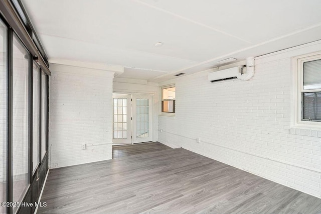 227 Rose Ave, Wilmington, NC 28403 - unfurnished sunroom featuring french doors and a wall mounted AC