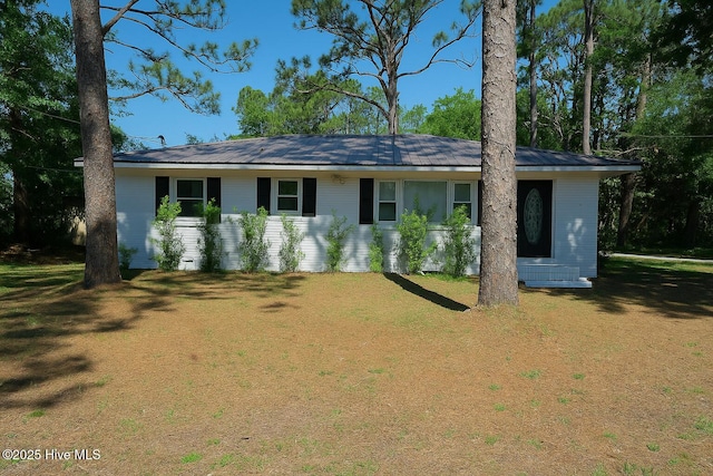 227 Rose Ave, Wilmington, NC 28403 - view of front of house featuring a metal roof and a front yard