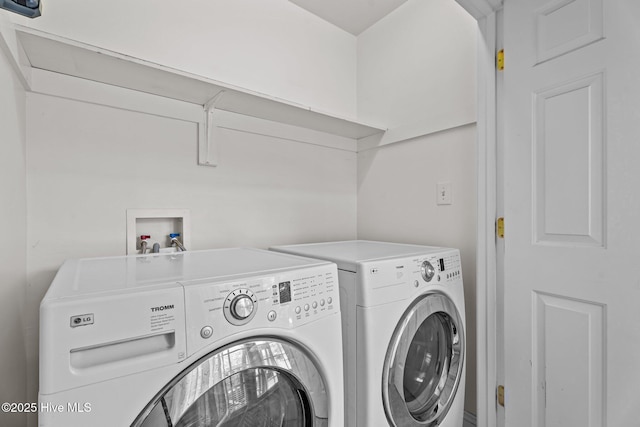 4710 Hudson Rd NW, Wilson, NC 27896 - laundry room with washing machine and clothes dryer