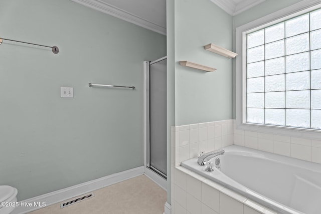 4710 Hudson Rd NW, Wilson, NC 27896 - bathroom with crown molding, a garden tub, a stall shower, toilet, and baseboards