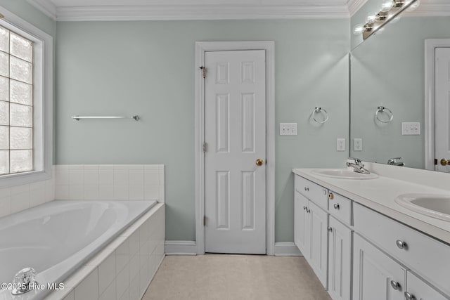 4710 Hudson Rd NW, Wilson, NC 27896 - bathroom with double vanity, a bath, crown molding, and baseboards