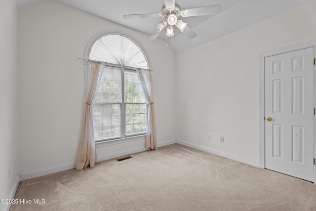 4710 Hudson Rd NW, Wilson, NC 27896 - unfurnished room featuring carpet flooring, a ceiling fan, baseboards, and lofted ceiling