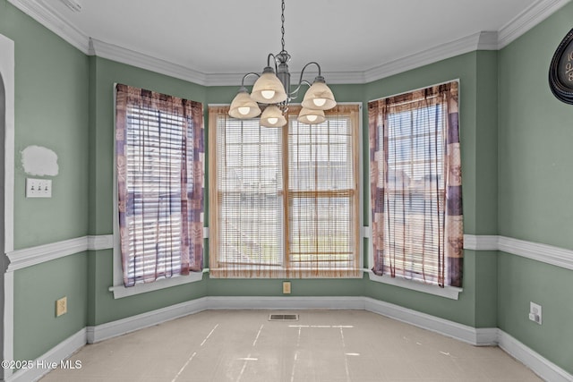 4710 Hudson Rd NW, Wilson, NC 27896 - unfurnished dining area featuring a chandelier, healthy amount of natural light, and crown molding
