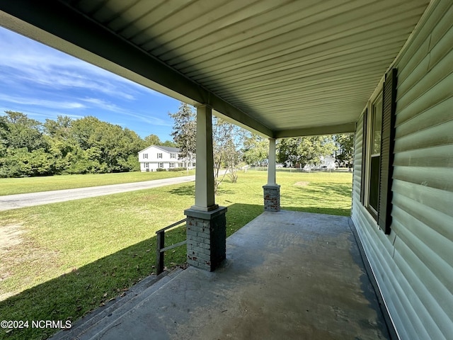 114 Rhodes Ave, Windsor, NC 27983 - covered porch featuring a lawn