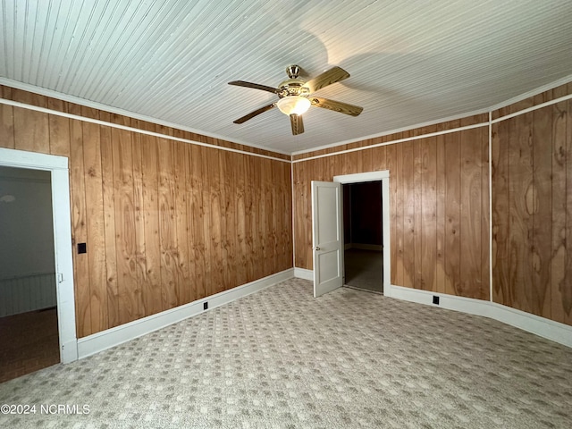 114 Rhodes Ave, Windsor, NC 27983 - unfurnished room featuring ceiling fan, carpet flooring, and wooden walls