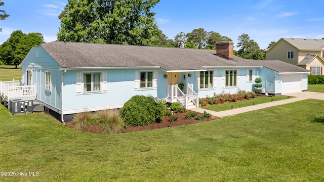 1235 Sound Shore Dr, Edenton, NC 27932 - single story home featuring a chimney, roof with shingles, a garage, crawl space, and a front lawn