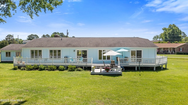 1235 Sound Shore Dr, Edenton, NC 27932 - rear view of property featuring a deck, a yard, and a chimney