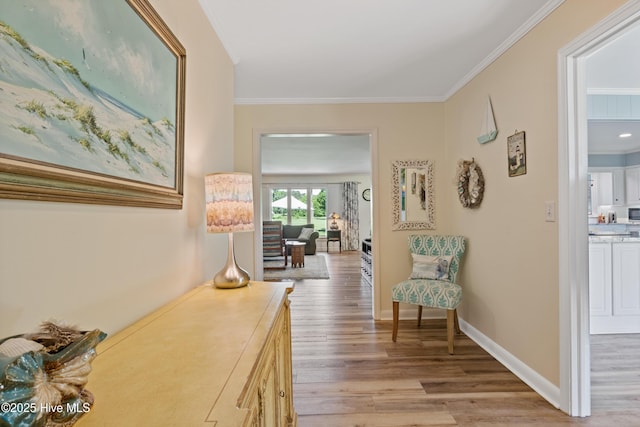 1235 Sound Shore Dr, Edenton, NC 27932 - hallway featuring crown molding, light wood-type flooring, and baseboards
