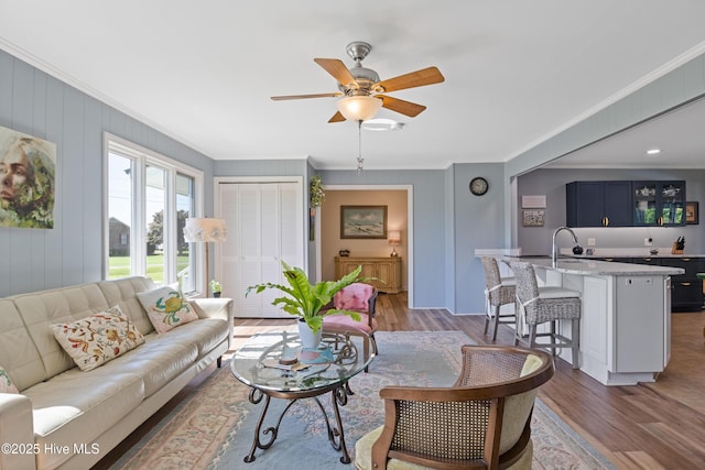 1235 Sound Shore Dr, Edenton, NC 27932 - living area with crown molding, wood finished floors, and ceiling fan