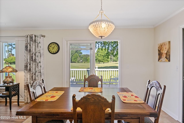1235 Sound Shore Dr, Edenton, NC 27932 - dining room with ornamental molding and a chandelier