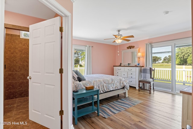 1235 Sound Shore Dr, Edenton, NC 27932 - bedroom featuring access to exterior, ornamental molding, wood finished floors, and ceiling fan