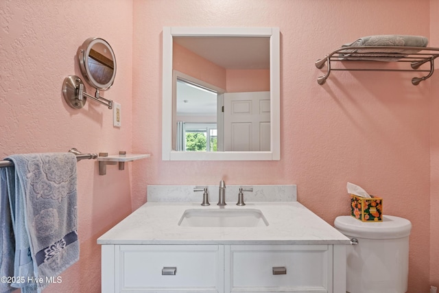 1235 Sound Shore Dr, Edenton, NC 27932 - bathroom with toilet, vanity, and a textured wall