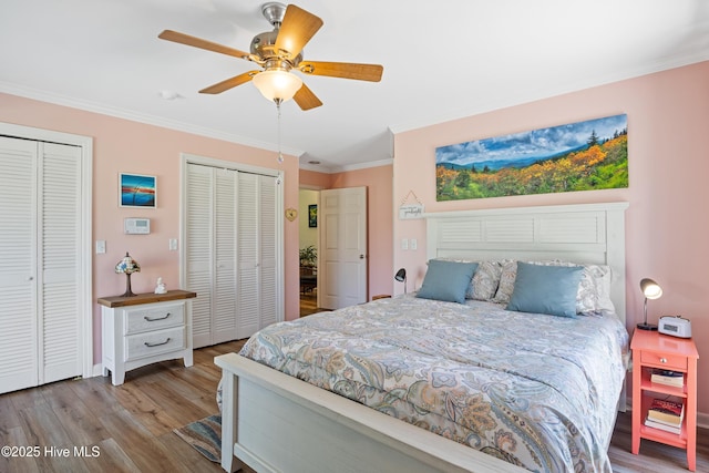 1235 Sound Shore Dr, Edenton, NC 27932 - bedroom with two closets, crown molding, wood finished floors, and ceiling fan