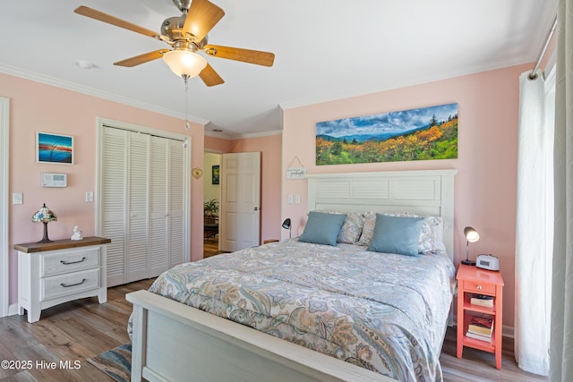 1235 Sound Shore Dr, Edenton, NC 27932 - bedroom featuring crown molding, wood finished floors, a closet, and ceiling fan