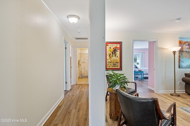 1235 Sound Shore Dr, Edenton, NC 27932 - hallway with crown molding, light wood-type flooring, and baseboards