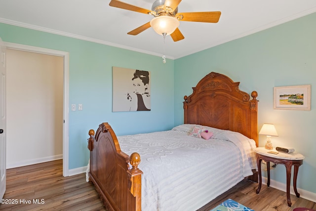 1235 Sound Shore Dr, Edenton, NC 27932 - bedroom featuring wood finished floors, baseboards, ceiling fan, and ornamental molding