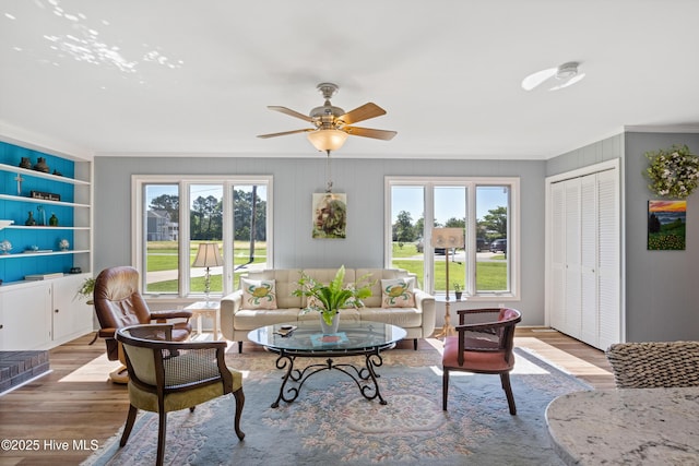 1235 Sound Shore Dr, Edenton, NC 27932 - living room featuring crown molding, wood finished floors, and ceiling fan