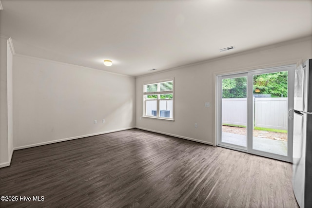 312 Glenellen Loop Rd, Midway Park, NC 28544 - empty room with crown molding, dark wood-type flooring, and baseboards