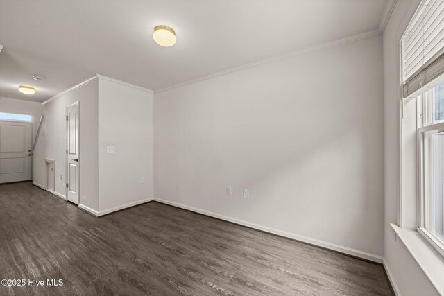 312 Glenellen Loop Rd, Midway Park, NC 28544 - spare room with ornamental molding, dark wood-style floors, and baseboards