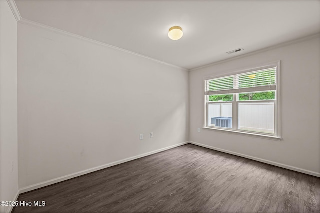 312 Glenellen Loop Rd, Midway Park, NC 28544 - empty room featuring ornamental molding, dark wood-type flooring, and baseboards
